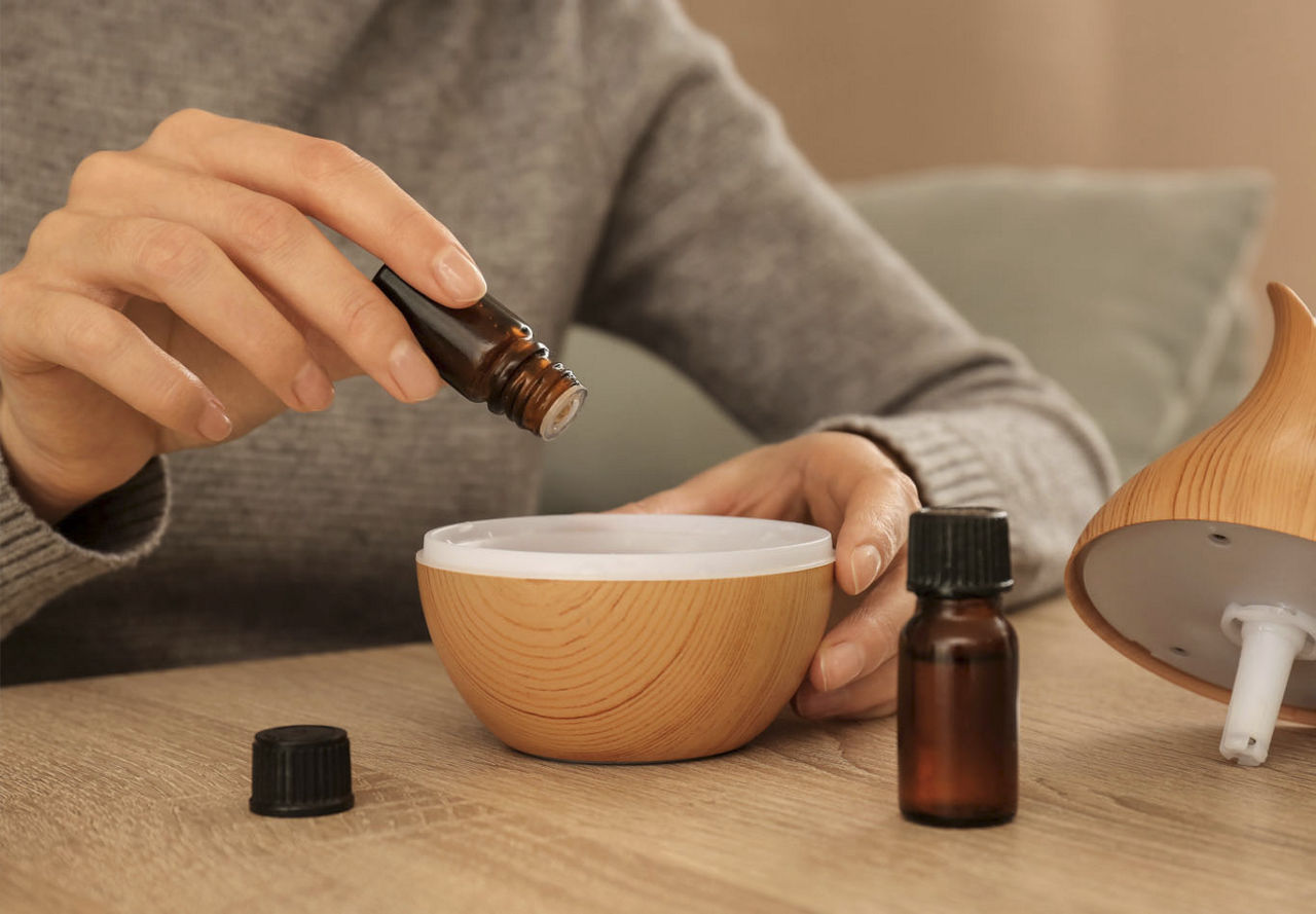 Essential oils being poured  | Blog | Greystar